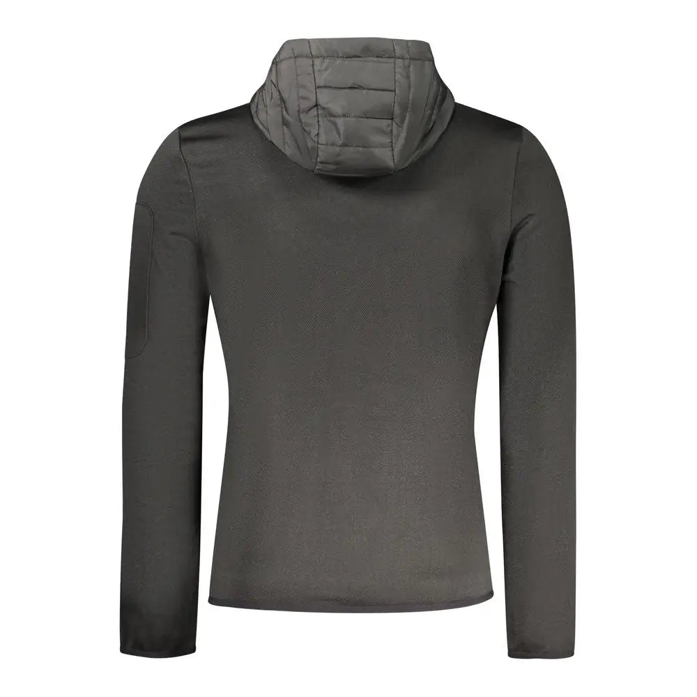 Stilfulde jakke fremstillet i elegant sort farve med paddet krave