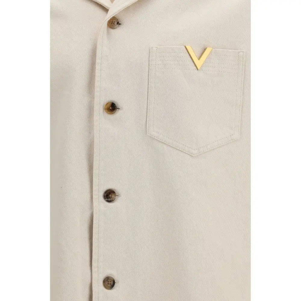 Valentino beige denim shirt with gold-tone V-shaped metal pin on pocket