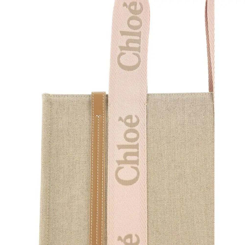 Chloé brun linsketter skulderpose i beige canvas med pink vævet strop