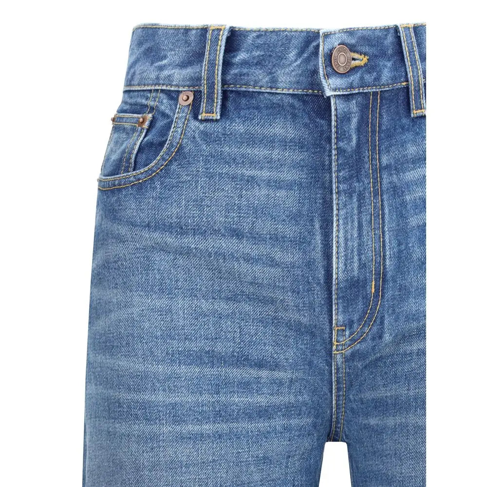 Chloé flare jeans i blå denim med klassisk femlommedesign og brune metal knapper