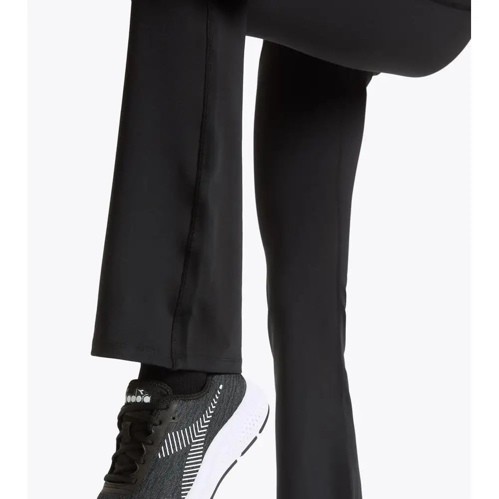 Diadora black polyester athletic pants with black shoe, white sole and geometric side pattern