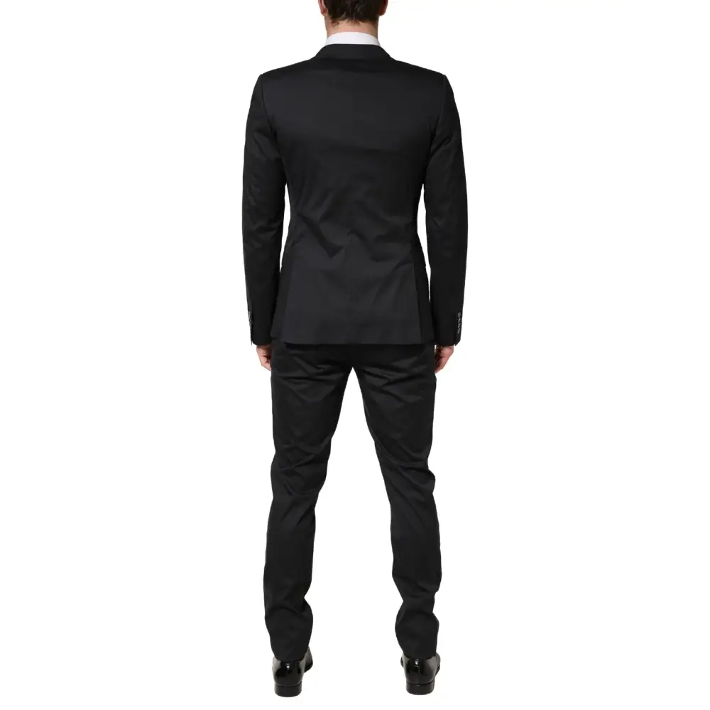Dolce & Gabbana sort bomuldssuit med moderne snit og subtil glans. Spar 30-70% på mode
