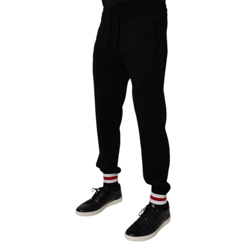 Dolce & Gabbana gabbana black wool mid waist joggers with red and white striped cuffs