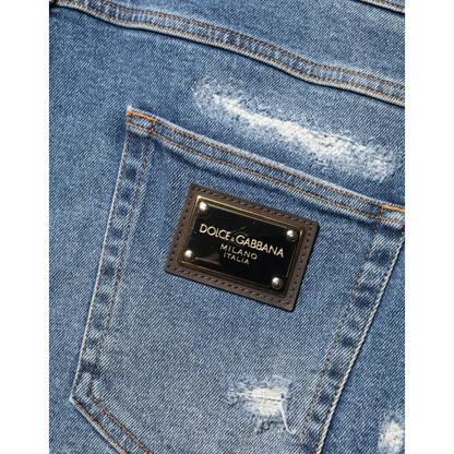 Dolce & Gabbana logo patch on blue cotton distressed bermuda shorts