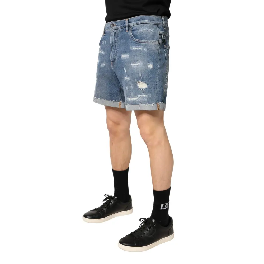 Dolce & Gabbana blue cotton distressed Bermuda shorts med råkanter