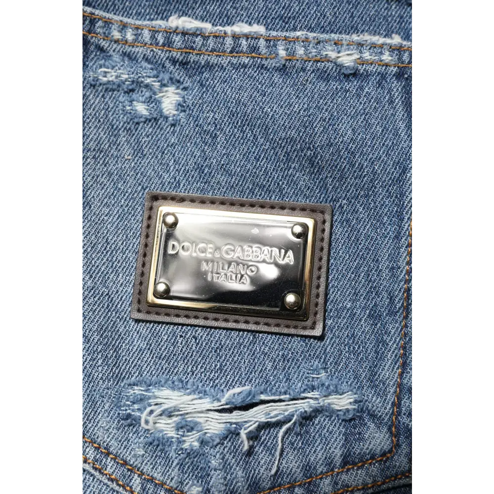 Dolce & Gabbana blå revnet bomuld logo denim jeans med metalplade