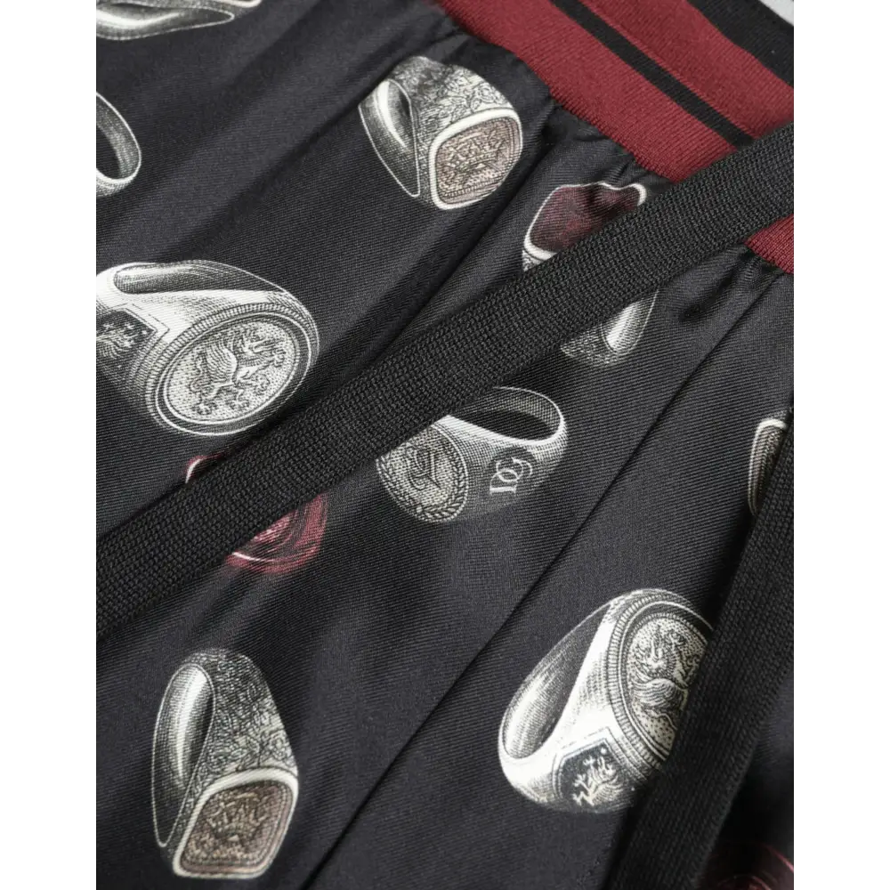 Dolce & Gabbana Elegant Silk Jogging Trousers with Ring Print - IT50/L - Bukser