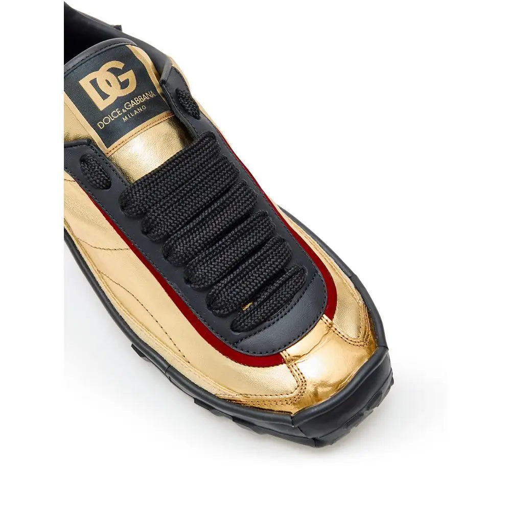 Dolce & Gabbana gold leather low top sneaker med rød syning