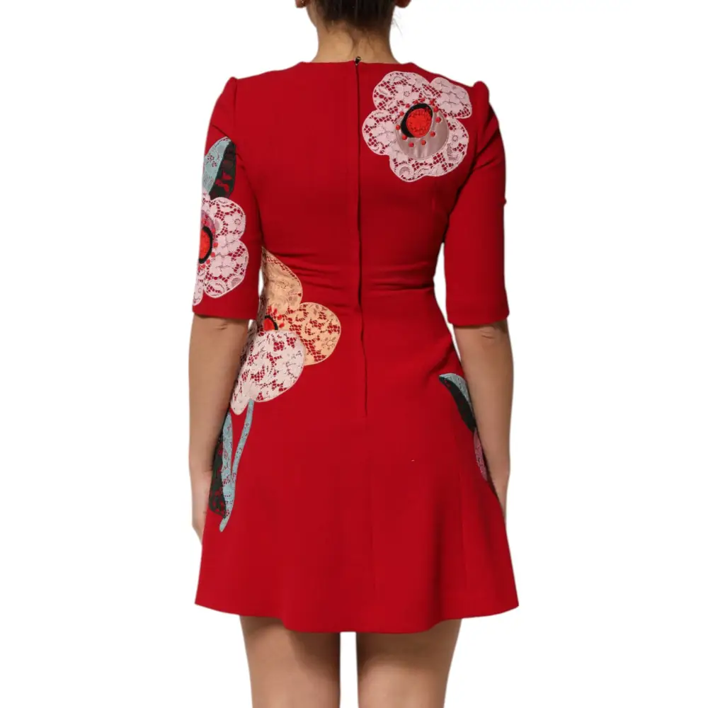 Dolce & Gabbana red lace floral applique A-line mini dress in vibrant red with pink, beige, and black lace details