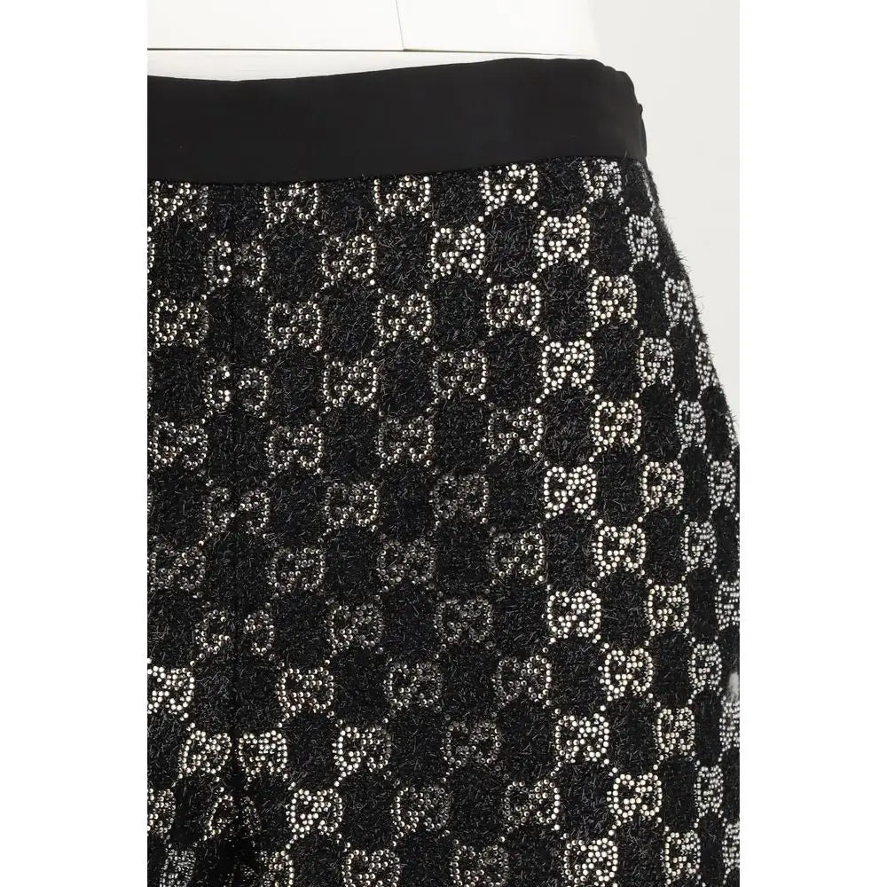 Sort Gucci sort og mini shorts i sort viskose med sort tweed-kilet med G-monogram og sølvperler