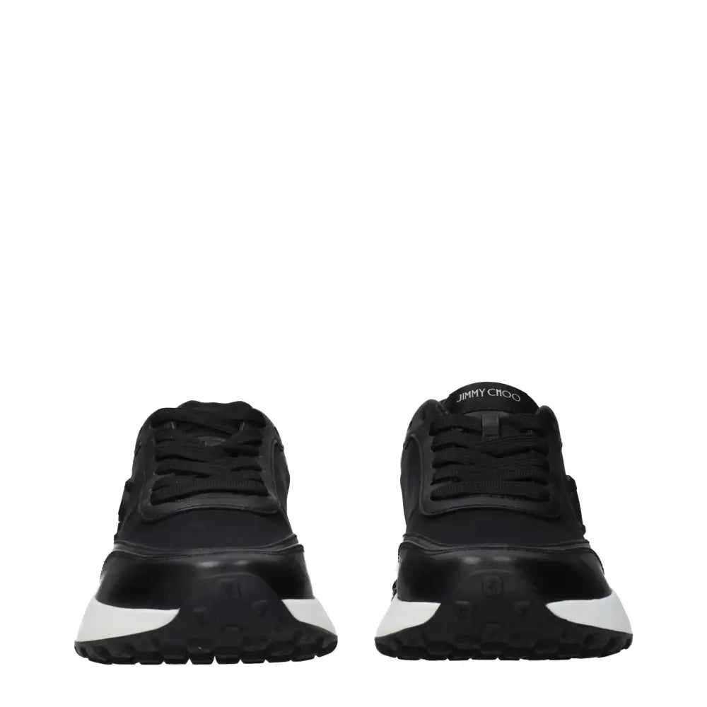 Jimmy Choo black fabric athletic sneakers with white sole accents and sleek design