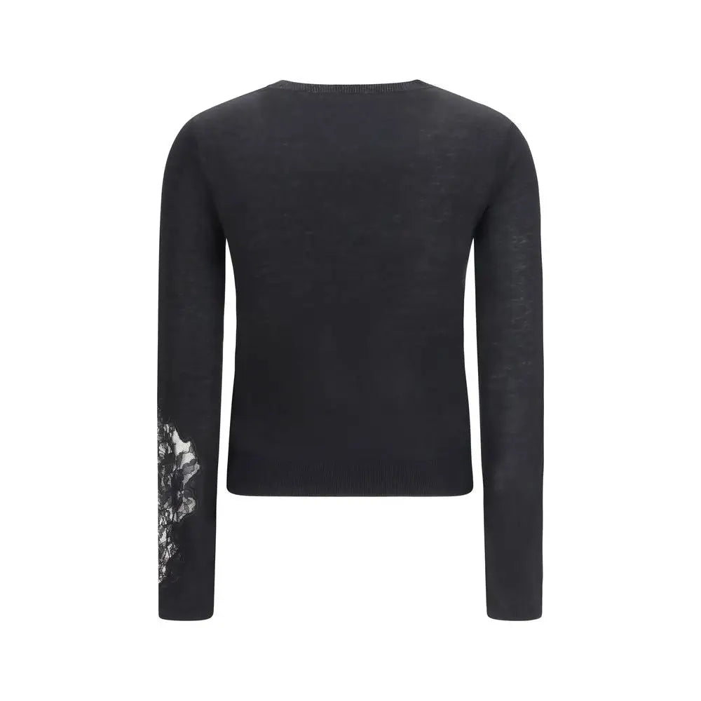 Max Mara black silk sweatshirt med sort strikket langærmet sweater og blødt spidse detaljer på venstre ærme