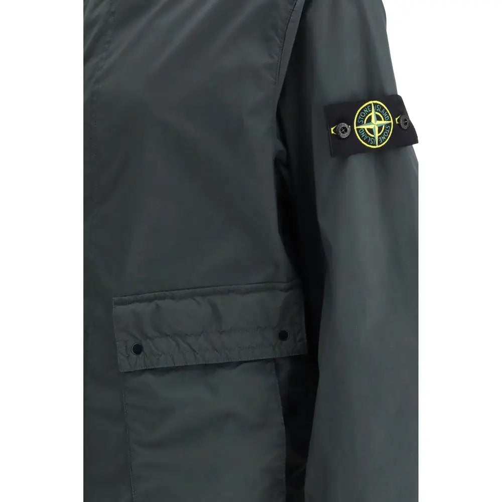 Stone Island grå polyester jakke med sort patch-logo i gult