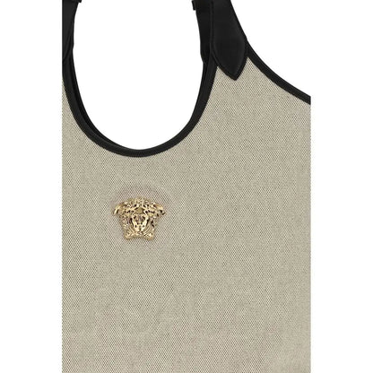 Versace beige cotton shoulder bag med beige vævet canvas, sort læder og guld Medusa