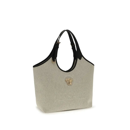 Versace beige cotton shoulder bag med beige canvas, sorte læderhåndtag og guld Medusa-spænde