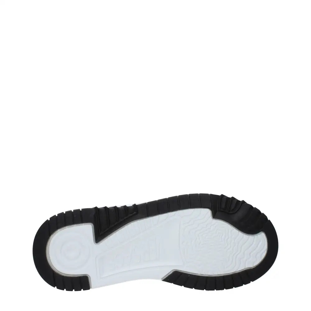 Versace white leather chunky sneakers with black and white rubber sole and textured pattern